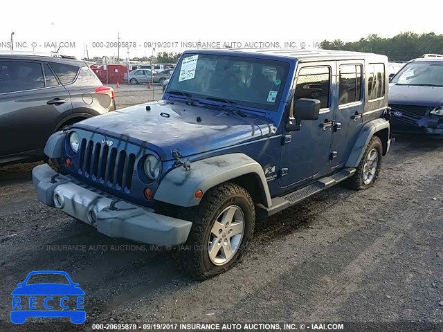 2009 Jeep Wrangler Unlimited 1J4GB39189L780308 зображення 1