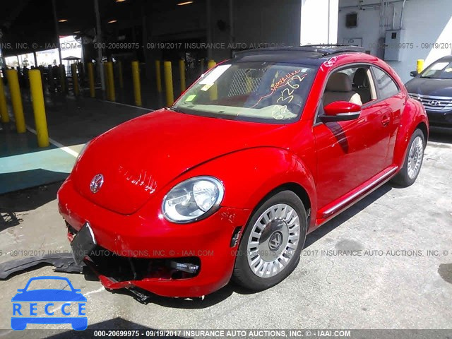 2014 Volkswagen Beetle 3VWJP7AT0EM633262 Bild 1