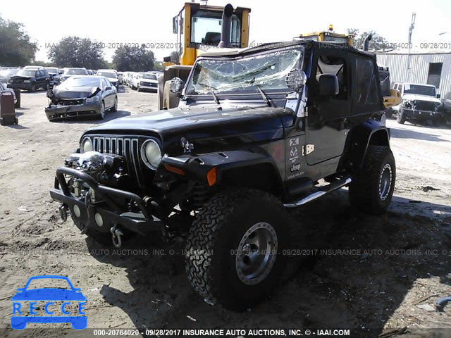 2004 Jeep Wrangler 1J4FA39S24P738693 зображення 1