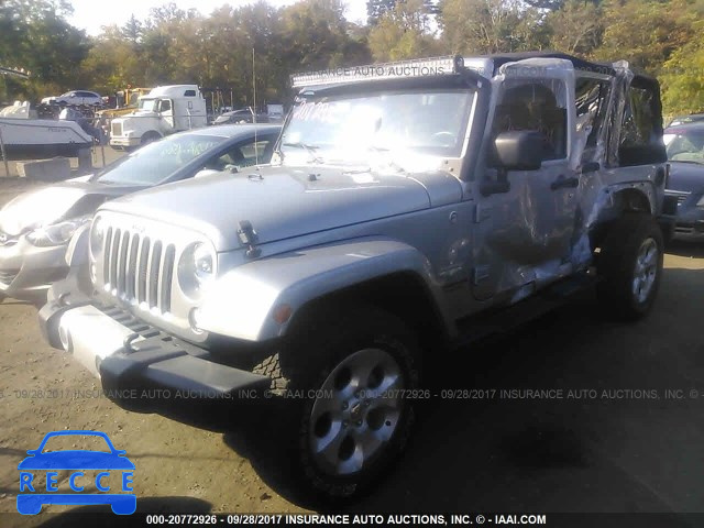 2015 Jeep Wrangler Unlimited SAHARA 1C4HJWEG0FL560231 image 1