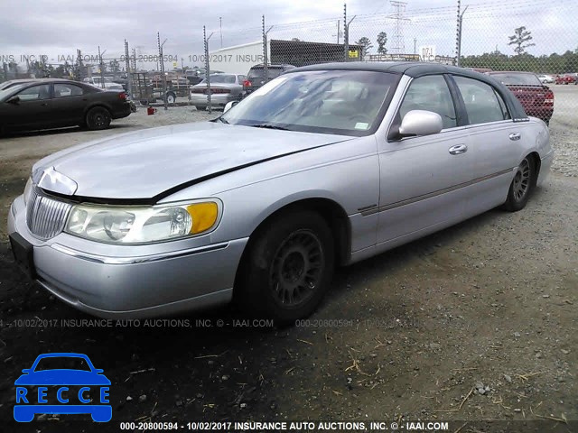 1999 Lincoln Town Car CARTIER 1LNFM83W7XY606190 image 1