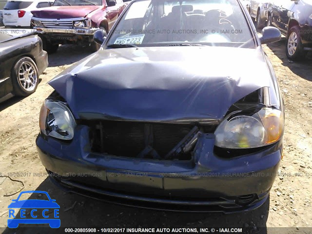 2005 Hyundai Accent KMHCG45C55U668505 зображення 5