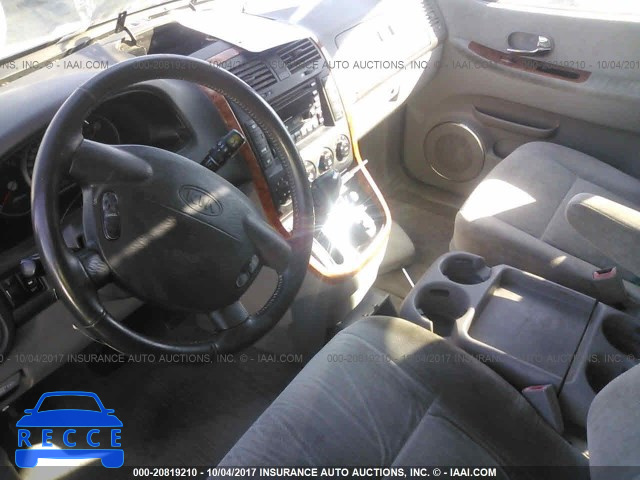 2004 KIA Sedona KNDUP131446529123 image 4