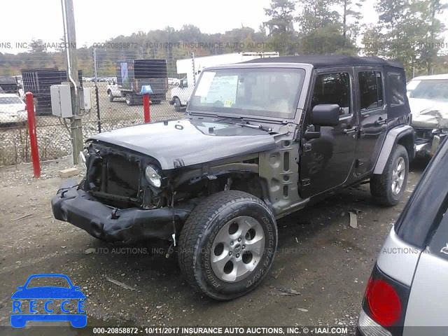 2014 Jeep Wrangler Unlimited SAHARA 1C4BJWEG5EL234154 зображення 1