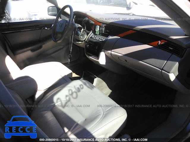 2003 Cadillac Deville 1G6KD54Y13U165095 зображення 4