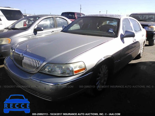 2004 Lincoln Town Car 1LNHM81W94Y619661 зображення 1