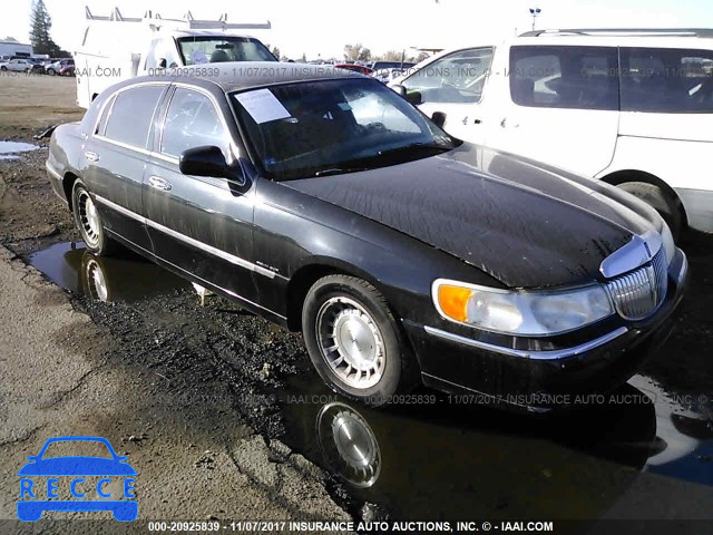 1999 Lincoln Town Car EXECUTIVE 1LNHM81W2XY709481 зображення 0