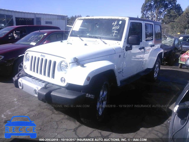 2014 JEEP WRANGLER UNLIMITE SAHARA 1C4BJWEG1EL326667 зображення 1