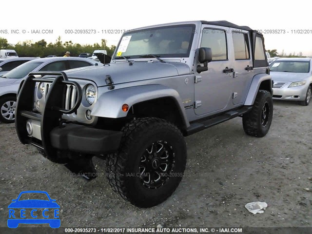 2014 Jeep Wrangler Unlimited SAHARA 1C4BJWEG1EL165611 зображення 1