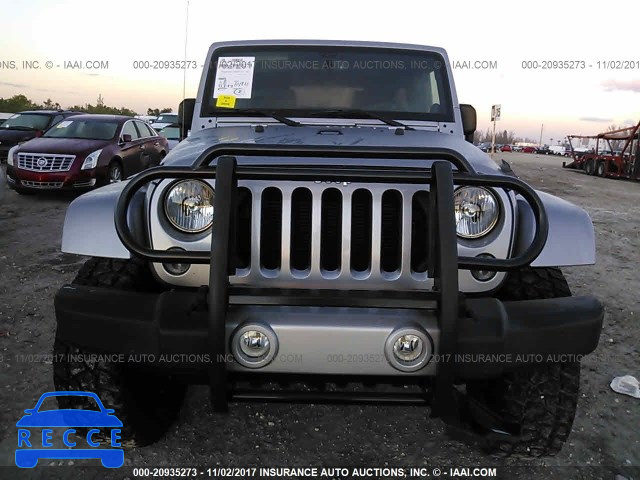 2014 Jeep Wrangler Unlimited SAHARA 1C4BJWEG1EL165611 зображення 5