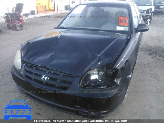 2005 Hyundai Accent KMHCG45CX5U653076 image 5