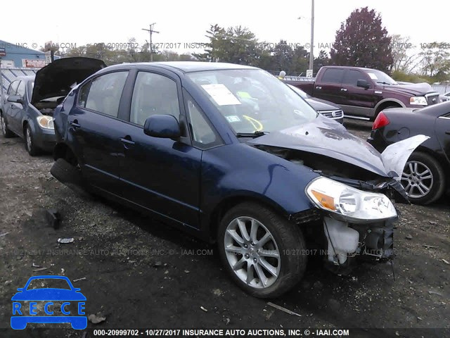 2011 Suzuki SX4 LE JS2YC5A23B6304517 image 0