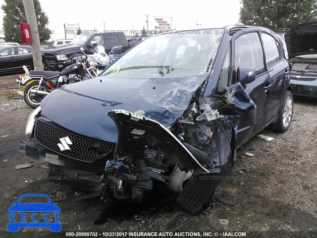 2011 Suzuki SX4 LE JS2YC5A23B6304517 Bild 1
