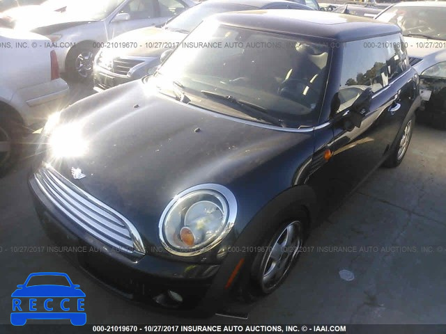 2008 Mini Cooper WMWMF33508TT67612 image 1