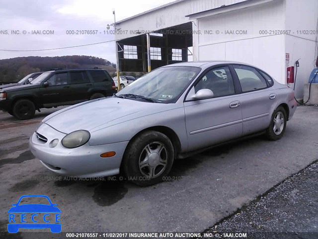 1999 FORD TAURUS 1FAFP53U0XG303305 image 1