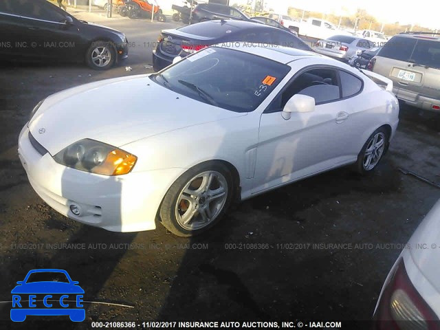 2003 Hyundai Tiburon KMHHN65FX3U062860 image 1