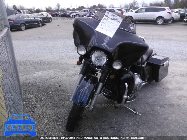 2004 HARLEY-DAVIDSON FLHT 1HD1DDV1X4Y717626 Bild 4