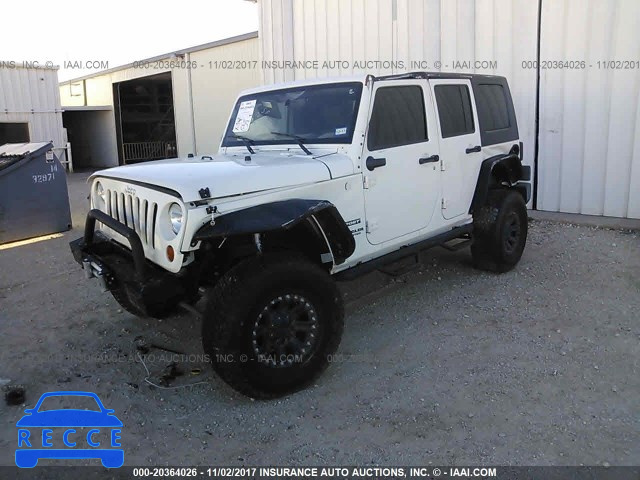 2010 Jeep Wrangler Unlimited SPORT 1J4HA3H15AL218833 зображення 1