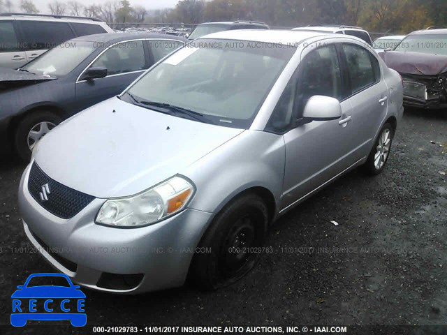 2011 Suzuki SX4 LE JS2YC5A29B6300875 image 1