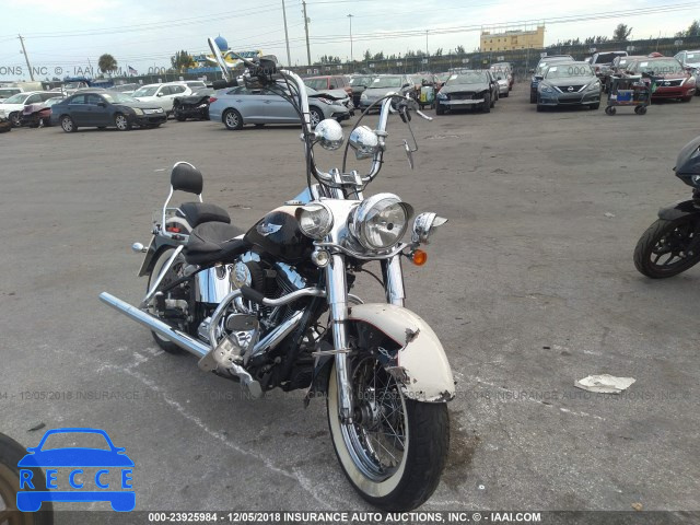 2011 HARLEY-DAVIDSON FLSTN 1HD1JD512BB014465 Bild 0