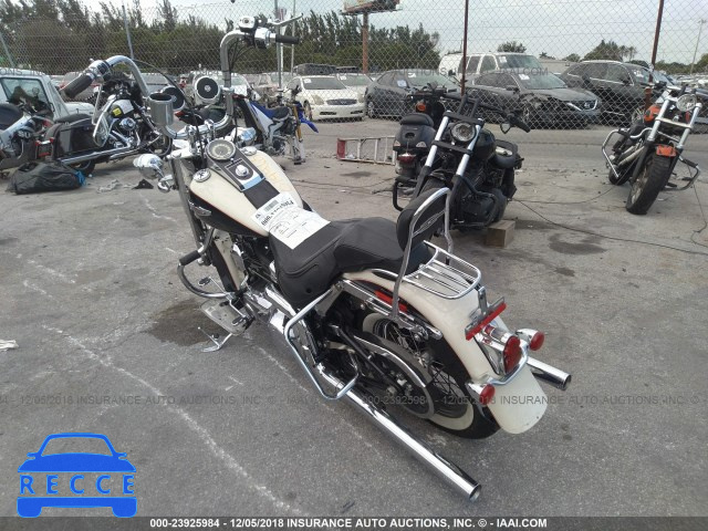 2011 HARLEY-DAVIDSON FLSTN 1HD1JD512BB014465 Bild 2
