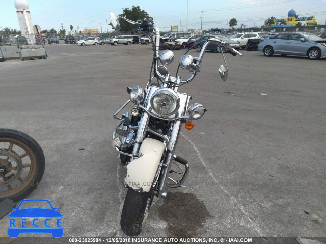 2011 HARLEY-DAVIDSON FLSTN 1HD1JD512BB014465 Bild 4