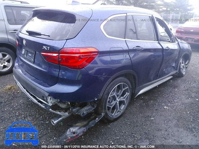 2018 BMW X1 XDRIVE28I WBXHT3C34J5K31590 Bild 3