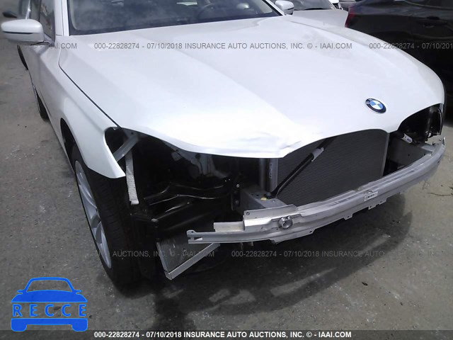 2016 BMW 750 I WBA7F0C56GGL99404 Bild 4