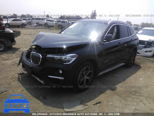 2018 BMW X1 XDRIVE28I WBXHT3C35J5K25989 Bild 1