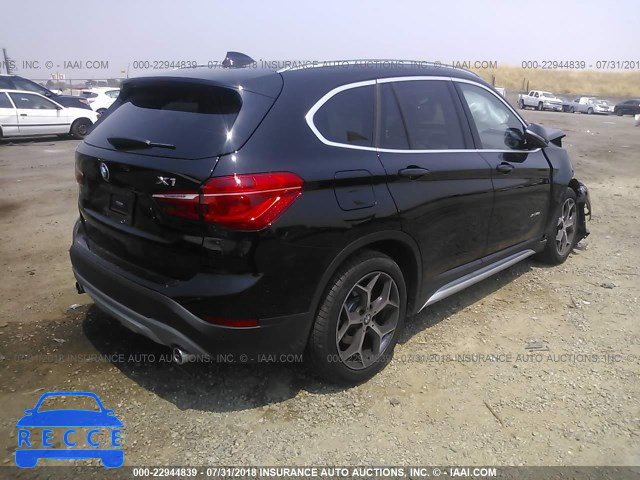 2018 BMW X1 XDRIVE28I WBXHT3C35J5K25989 Bild 3